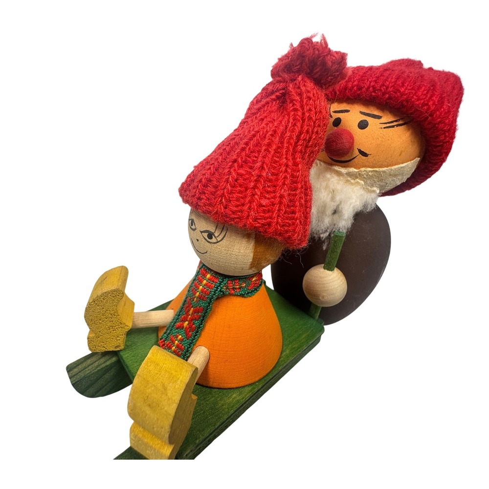 Vintage Scandinavian Wooden Christmas Figurine Gnome Santa on Sled Red Knit Hats